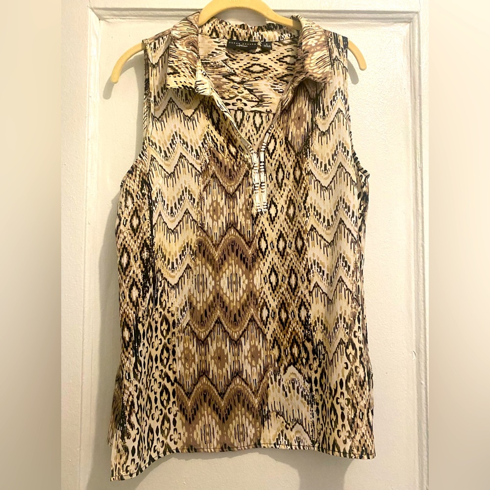 Womens top . Gently used from a Smoke free/pet free home .
